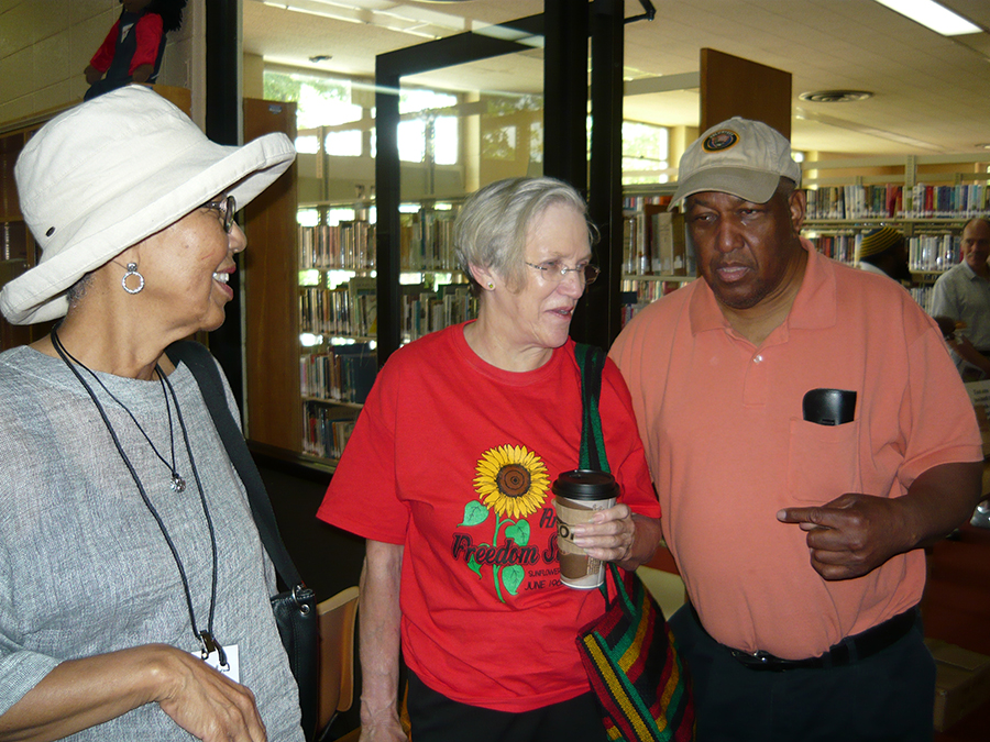 Civil rights veterans catching up after book event in 2014.